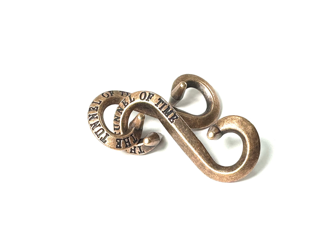 Classic Metal Wire Puzzles – Assorted Designs