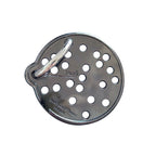 A circular metal puzzle with multiple holes and a small metal loop attached to one side.